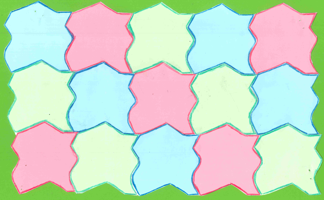 A tessellation created with coloured paper.